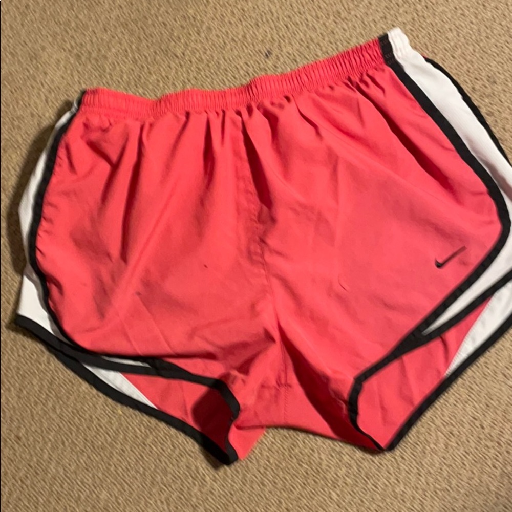 Pink Nike runners shorts